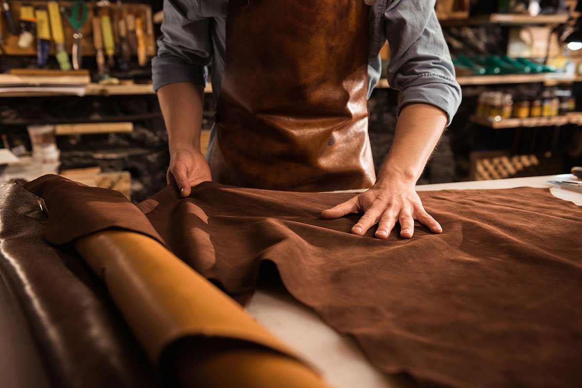 close-up-of-a-cobbler-working-with-leather-textile-resize.jpg close-up-of-a-cobbler-working-with-leather-textile-resize.jpg